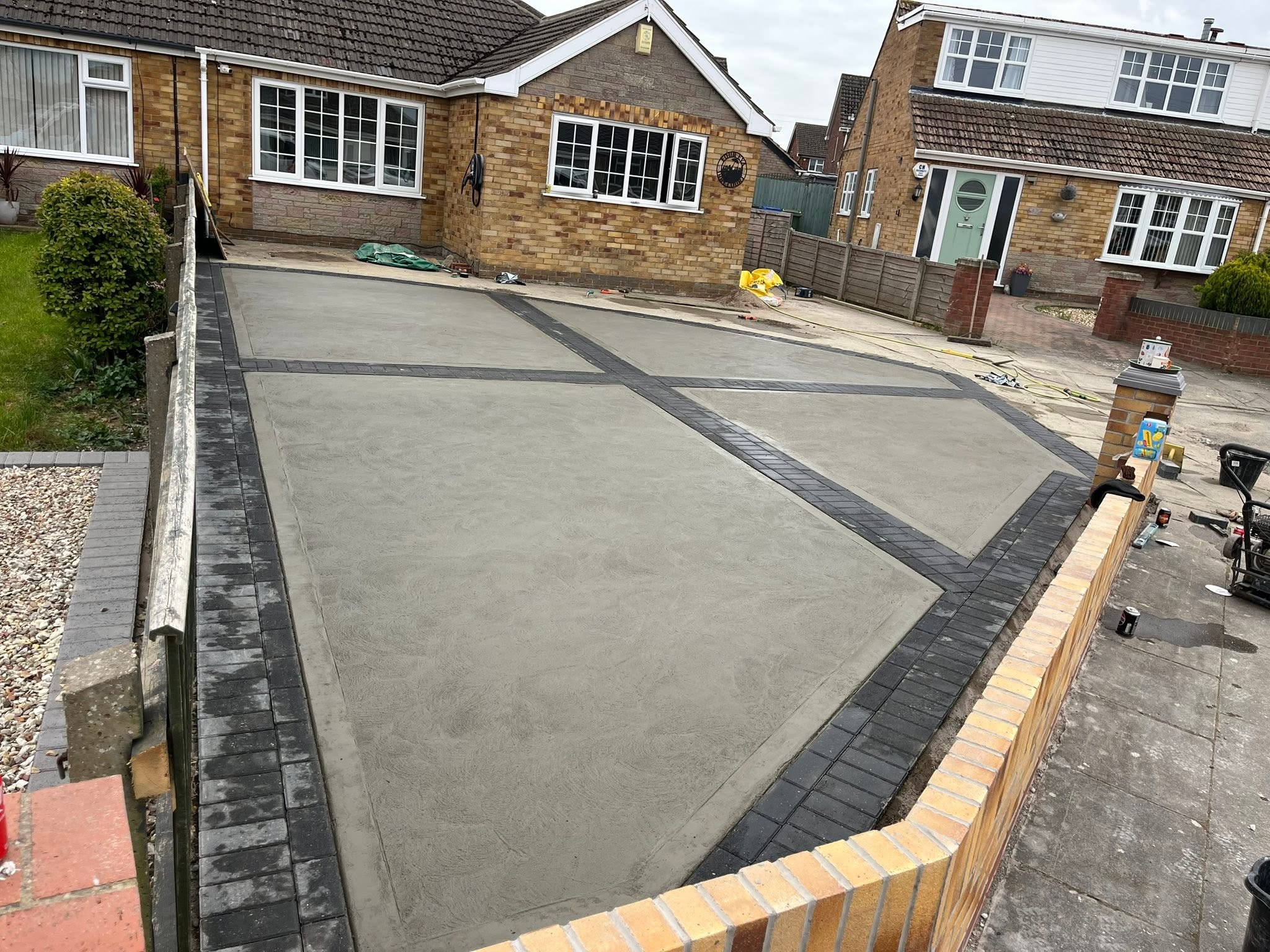 Driveway sub-base with charcoal block border