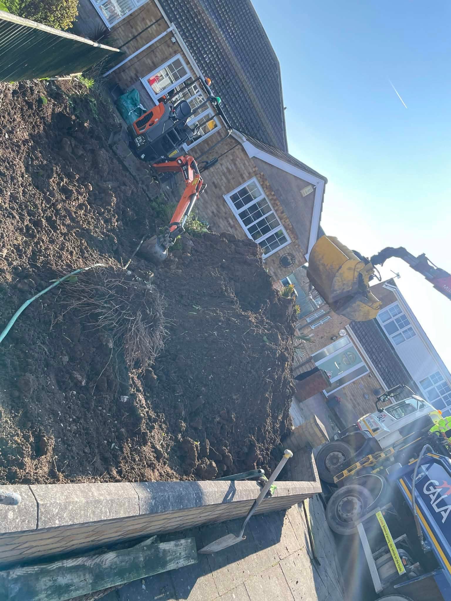 Garden excavation with digger