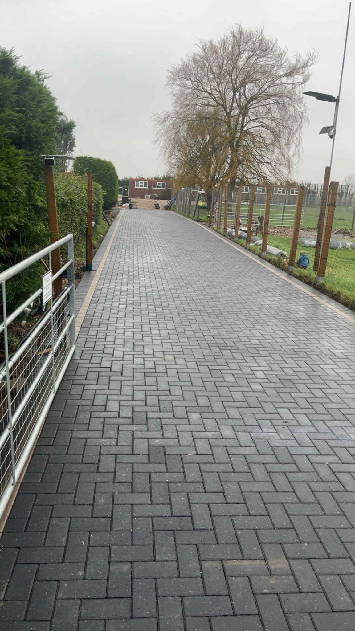 Charcoal block paved path