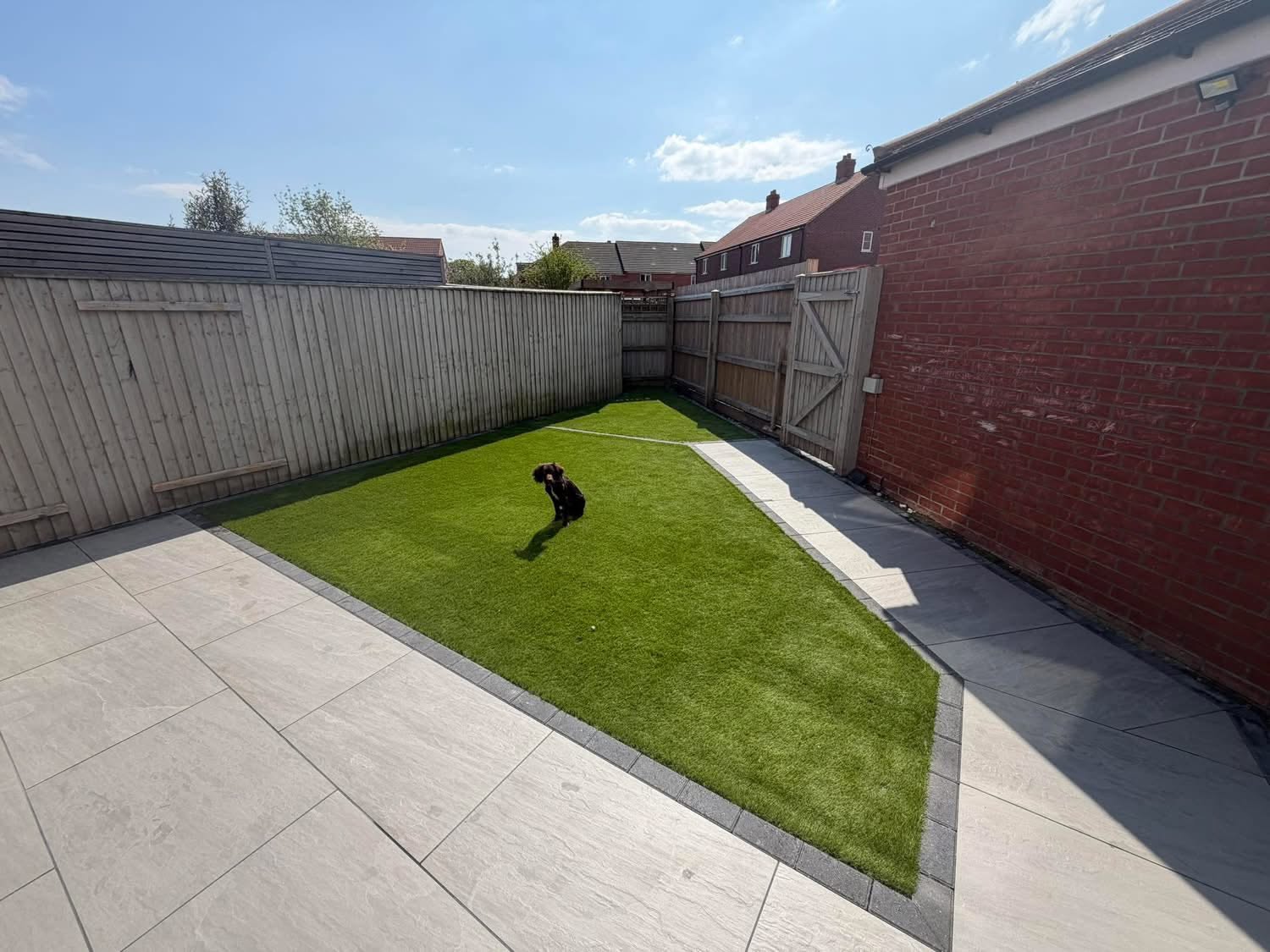 Porcelain paving with artificial grass