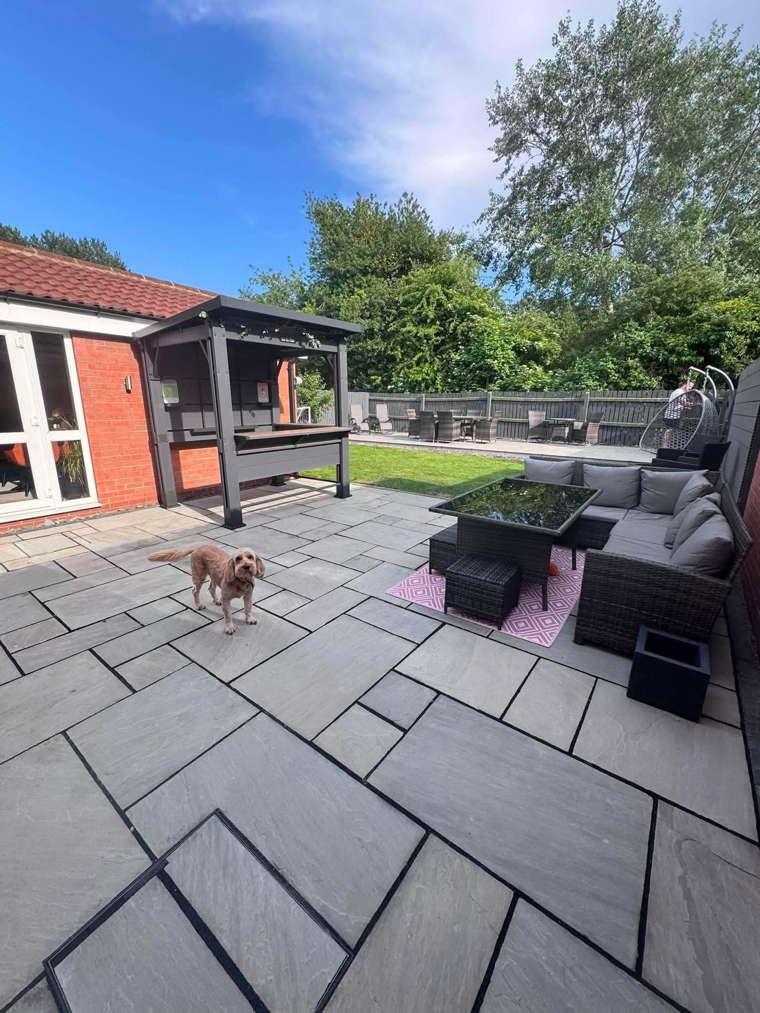 Large dark grey porcelain patio